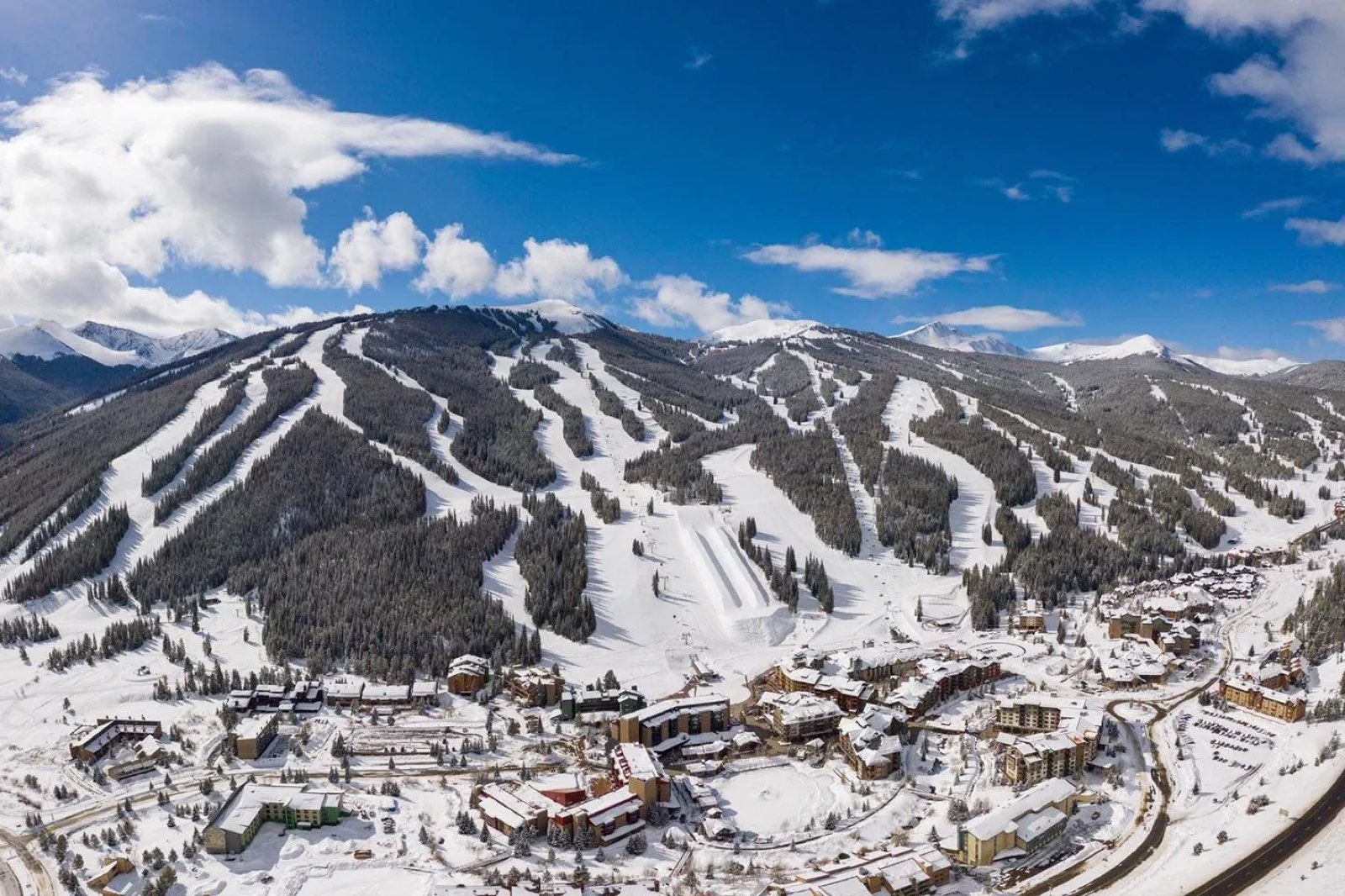 Aerial view of Copper Mountain Resort and the surrounding Colorado Rocky Mountains in winter